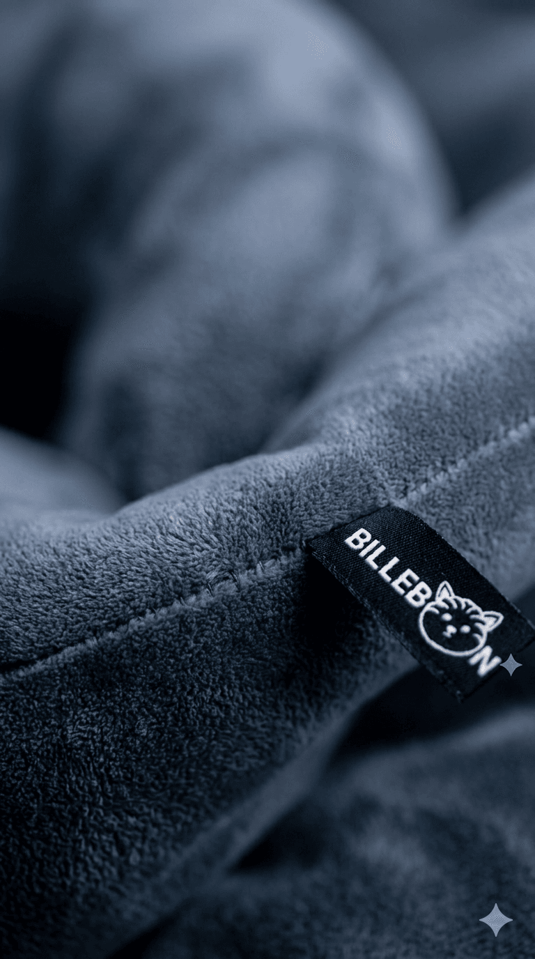 Soft blue plush fabric with a black Billebon brand tag and white cat logo.